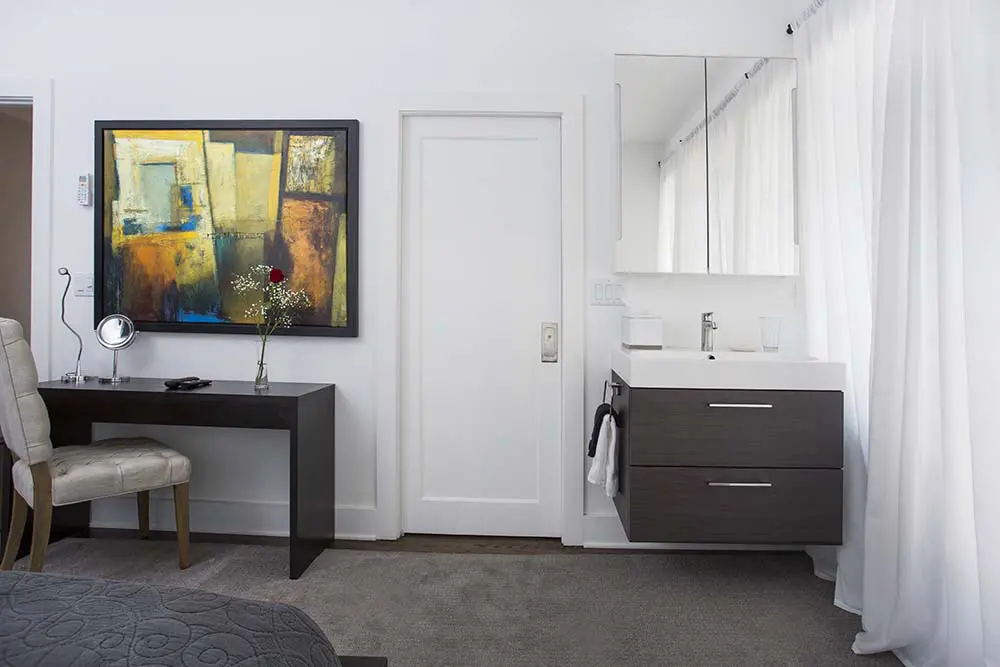 Vanity with mirror and desk